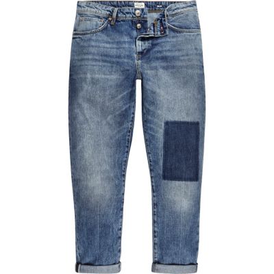 Mid wash patchwork Jimmy slim tapered jeans
